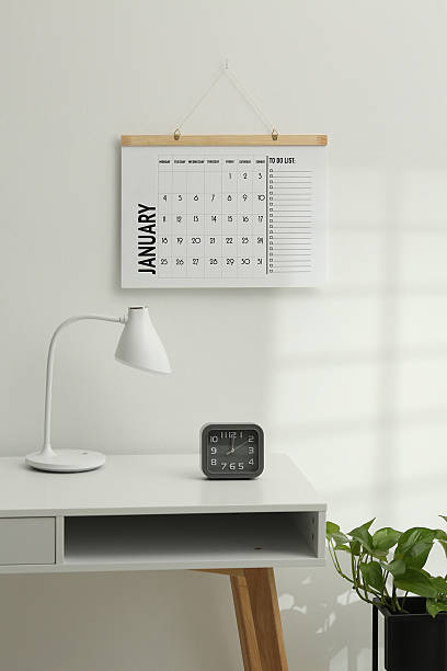 istock Desktop calendar on a modern desktop. Schedule and time planning in office and business. 2238812970