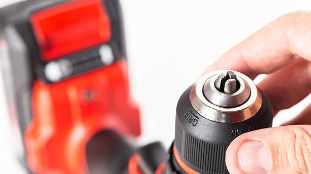 istock Adjusting the screwing power in a modern drill screwdriver, close-up, industry 2238823977