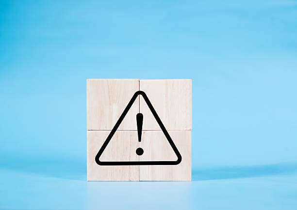 istock Black exclamation warning sign or caution symbol consisting of sticks on blue background for warning of errors and maintenance concept. 2238832511