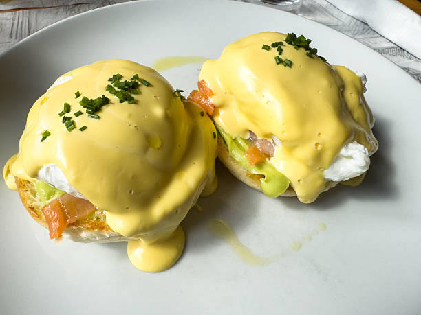 Delicious eggs benedict with smoked salmon and avocado, lifestyle