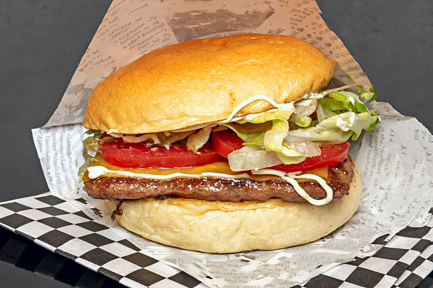 istock the combination of cooked ground beef and a bread bun quickly became established in the United States 2238846688