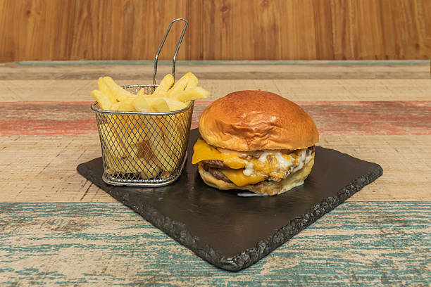 istock Since its inception, the hamburger has been an accessible food for all social classes, uniting people around a common culinary experience 2238846748