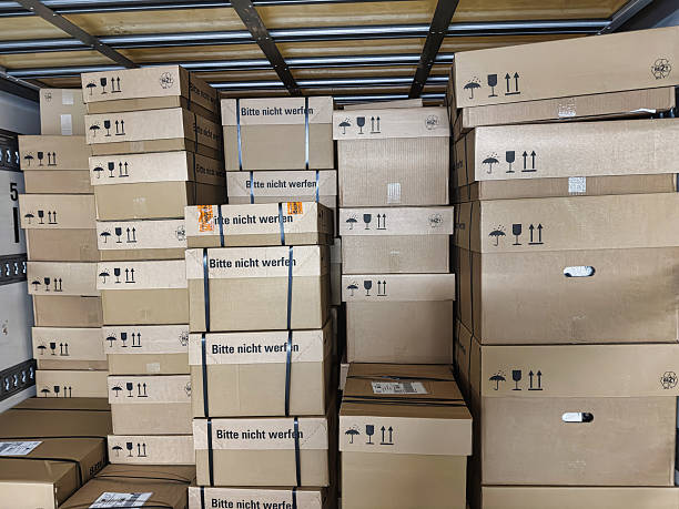 istock Logistics cargo truck fully loaded with cardboard boxes parcels for delivery shipping and warehouse storage 2238853839