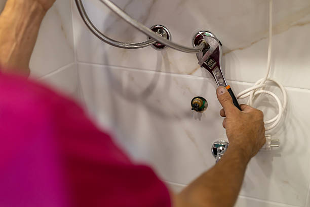 istock A mature man using adjustable wrench to install flexible water supply pipes. 2238859332