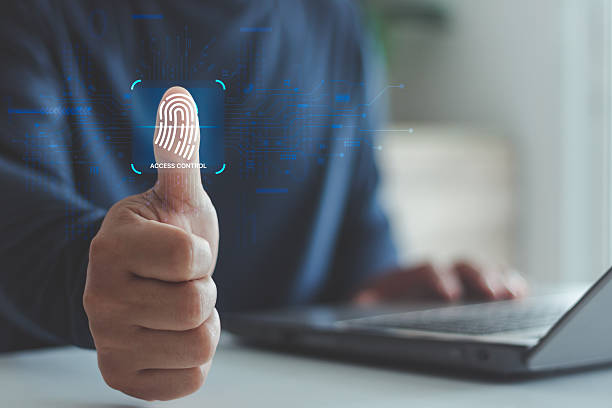 istock Businessman hand showing fingerprint scan with digital access control icon, concept of biometric security, identity verification, authentication system, data protection and cybersecurity technology. 2238863259