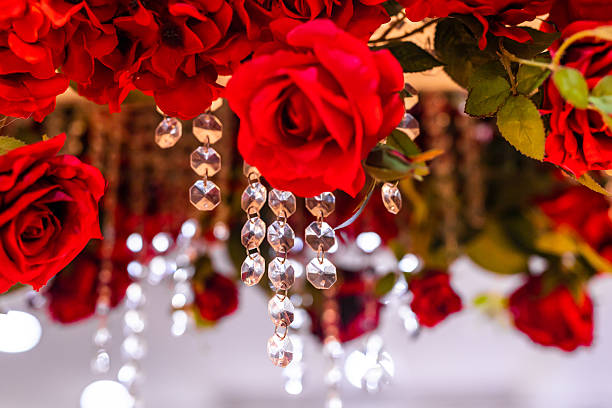 Intricate & Festive Red & Pink Roses With a Rattan Background in Bright Natural Light for Valentine's Day in 2023.
