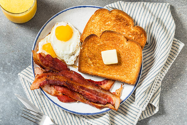 istock Healthy American Bacon Egg and Toast Breakfast 2238875638