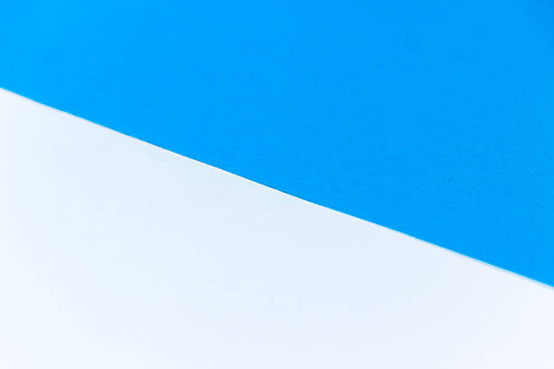 istock Background material divided into blue and white areas by a diagonal boundary line 2238878822