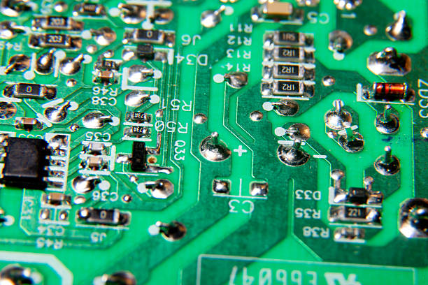 istock connecting tracks of an electronic printed circuit board with electronic components 2238887571