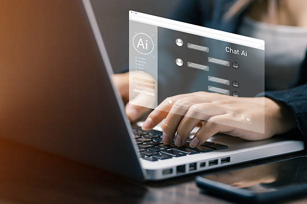 istock A person typing on a laptop with a futuristic AI chat interface on screen, representing artificial intelligence, chatbot technology, machine learning, and digital communication in modern business. 2238893871