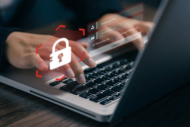 istock A woman typing on laptop with digital lock icon and login form, symbolizing secure login, data privacy, password protection, and cybersecurity in online authentication systems. 2238893894