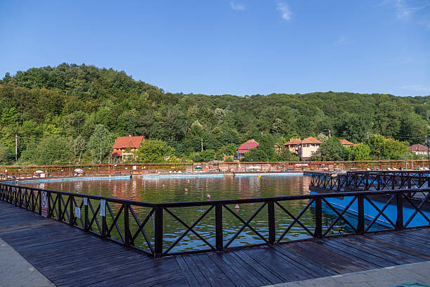 Baile Sacelu, Gorj County, Romania – July 24, 2022: View from inside the treatment base - the pools with therapeutic mud in Baile Sacelu resort