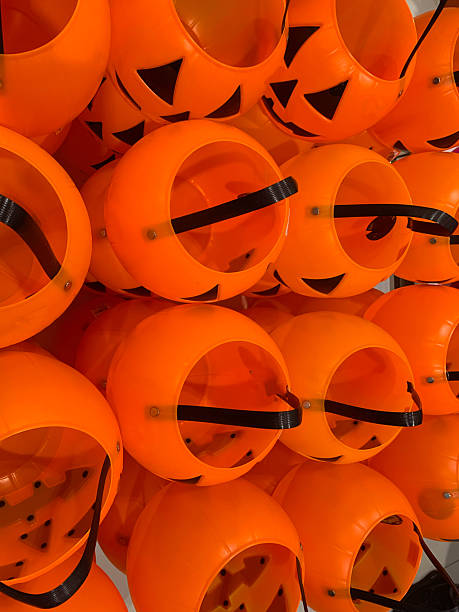 istock Jack-o'-lantern baskets for Halloween Trick or Treat vertical shot 2238898885