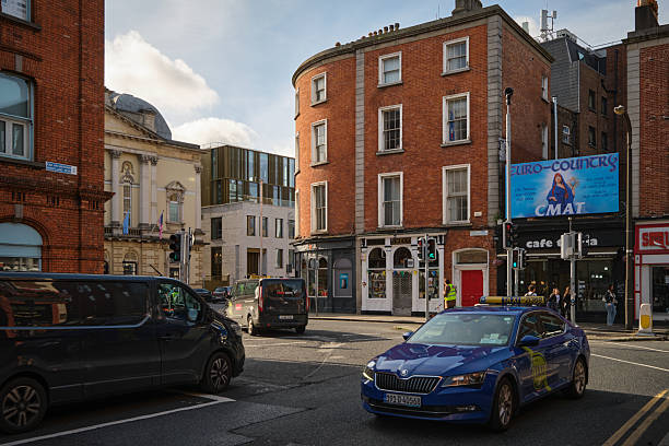 Dublin, Irland - October 2 2025: traffic at crossroad on ordinary day