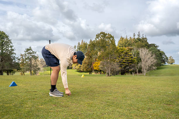 istock Golfer Placing a Tee on the Fairway 2238905177