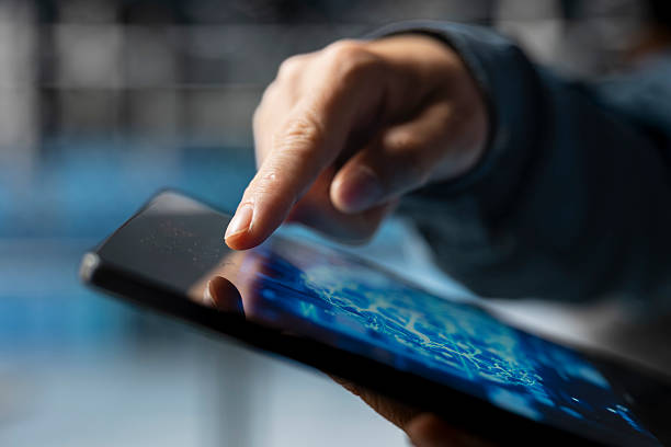 istock Extreme close up of data center developer using device to do AI improvements 2238910968