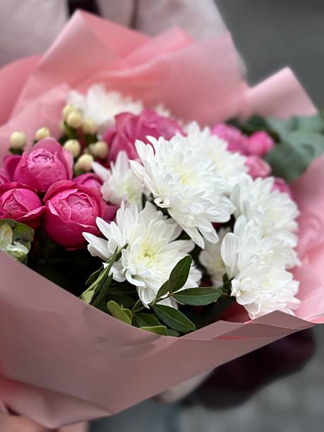 istock pink roses and white chrysanthemums bouquet 2238914631