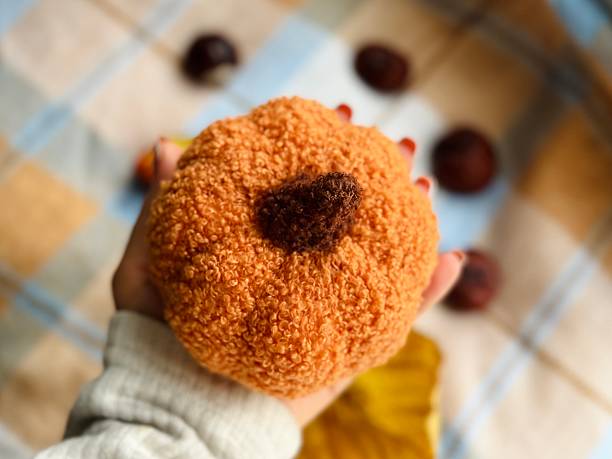 istock plush knitted pumpkin for decoration 2238914665