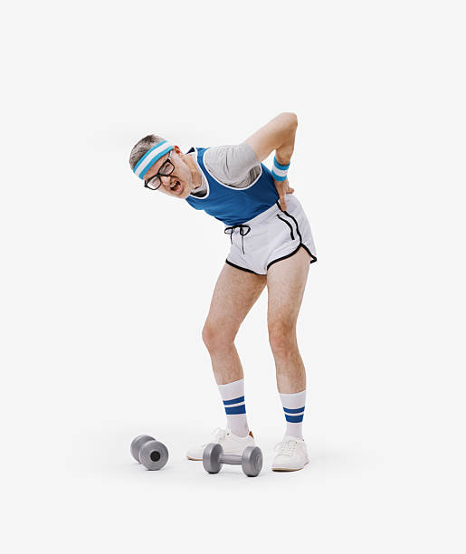 istock Funny guy exercising with dumbbells and suffering from back pain 2238916868
