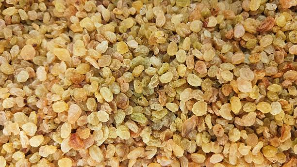 istock close up of raisin background brown group pattern. 2238918113
