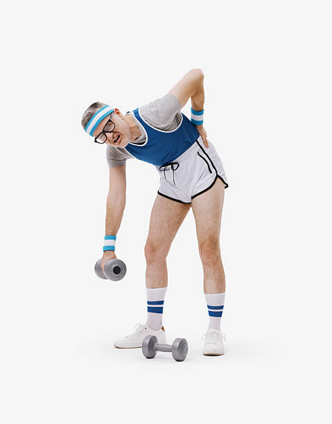 istock Funny guy exercising with dumbbells and suffering from back pain 2238918654