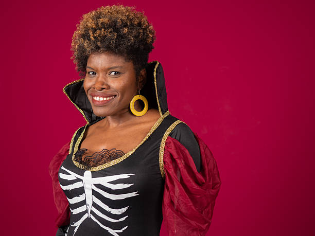 istock Woman smiling wearing halloween skeleton costume 2238919962