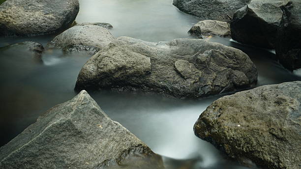 istock Silky Water River Boulders 2238921552