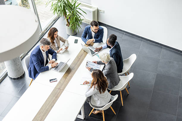 istock Diverse business team collaborating during a meeting in modern office 2238923242