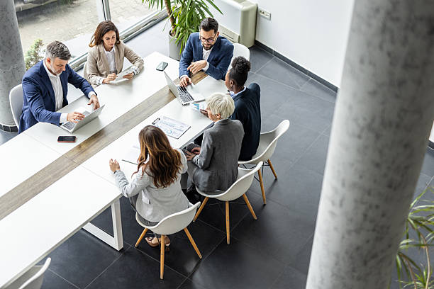 istock Diverse business team collaborating during a corporate meeting in office 2238923288