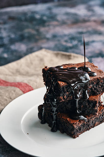 istock Chocolate Brownies Served with Chocolate Sauce 2238925011