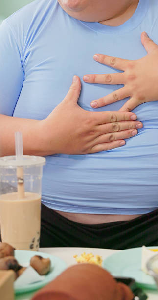istock junk food experiencing acid reflux 2238925178