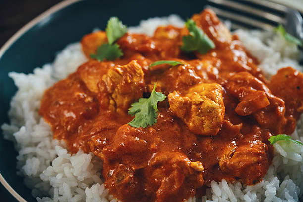 istock Indian Chicken Curry with Naan Bread and Pappadom 2238925277