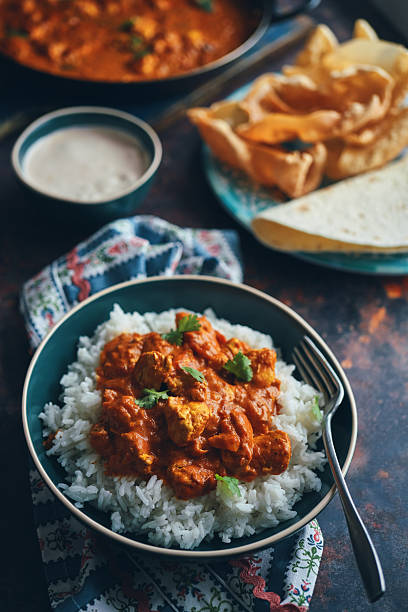 istock Indian Chicken Curry with Naan Bread and Pappadom 2238925306
