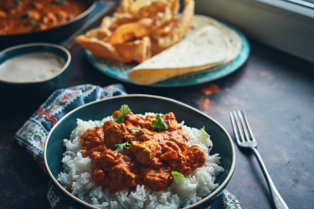 istock Indian Chicken Curry with Naan Bread and Pappadom 2238925335