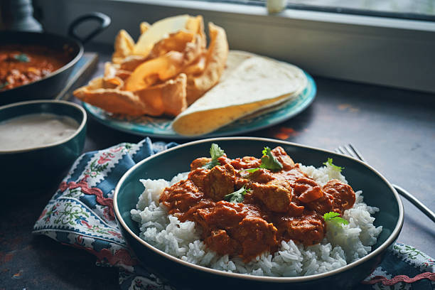istock Indian Chicken Curry with Naan Bread and Pappadom 2238925401