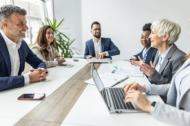 istock Business professionals collaborating in a modern office meeting 2238927192