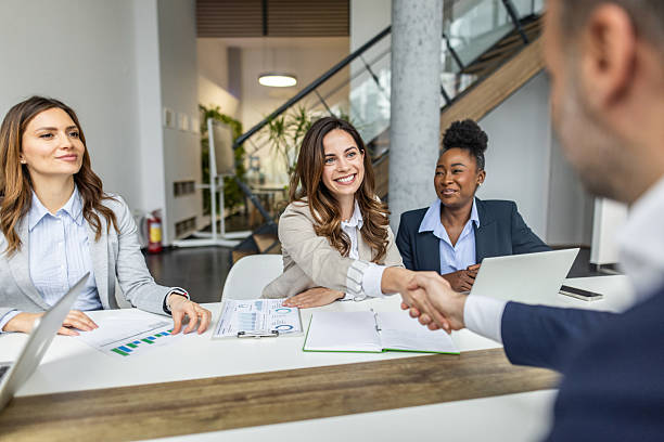 istock Diverse businesswomen shaking hands after successful job interview 2238928182