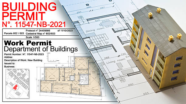 istock APPROVED BUILDINGS PERMIT concept with residential building project and condominium residential model 2238932923