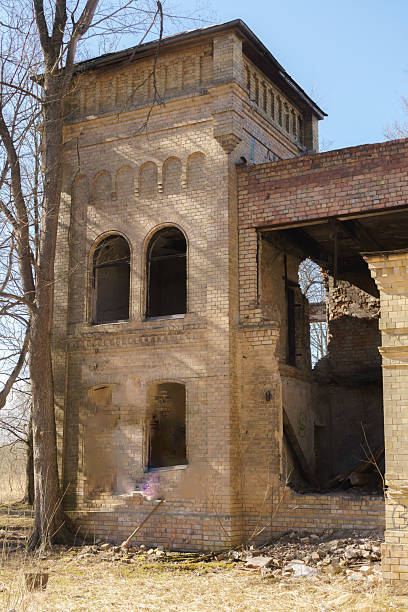 istock Ruins of an Abandoned Historic Brick Mansion Under Blue Sky 2238935567