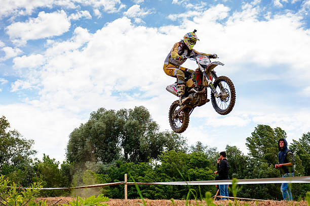 uzhhorod, ukraine - may 21, 2017: motorbike extreme jump. extreme enduro motocross in action. country cross ktm sports