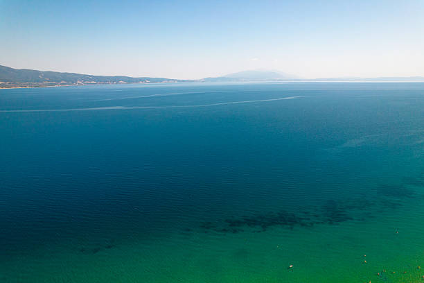 Calm clear blue and green water in the sea during summer