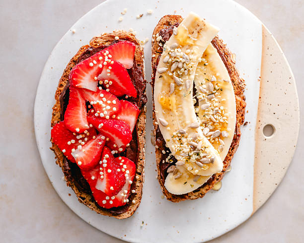 istock Toasts with chocolate spread and fruit 2238943936