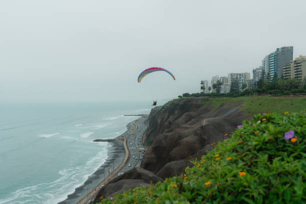 istock Paragliding above the ocean  in Lima, Peru 2238954779