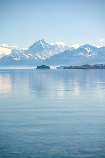 Looking across the spectacular blue waters of Lake Pukaki towards Mt Cook/Aoraki, on New Zealand's South Island.