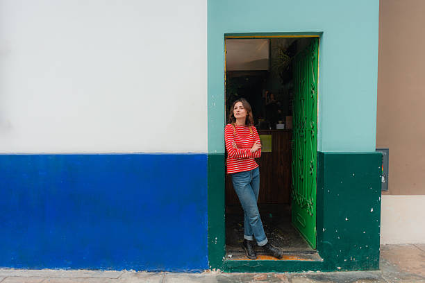 Woman exploring architecture in culture during experiential trip to  Lima, Peru