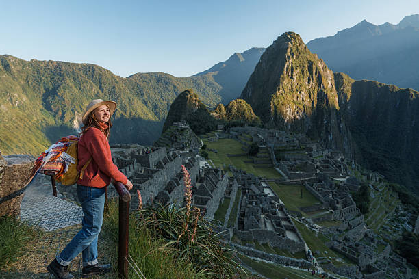 istock Woman exploring Machu Picchu during trip to Peru 2238956157
