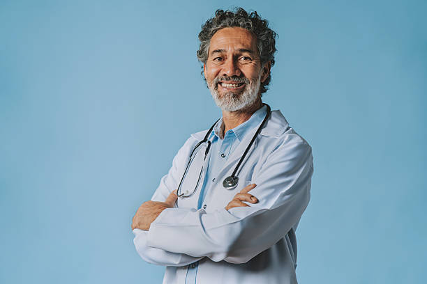 istock Senior male doctor looking at camera 2238958486