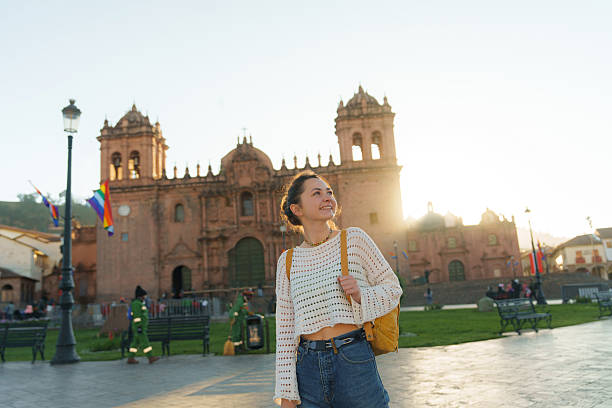 istock Woman walking in old town Cusco exploring Peruvian culture 2238959720