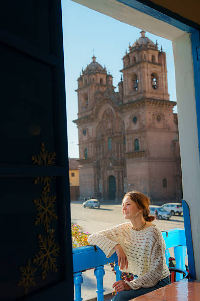 istock Woman looking at Plaza de Armas in Cusco, Peru from balcony 2238960773