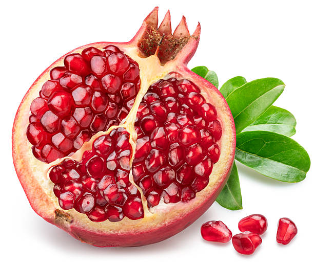 istock Pomegranate half with pomegranate seeds and leaves isolated on a white background. Clipping path. Stacking focus, maximum detail. 2238961532